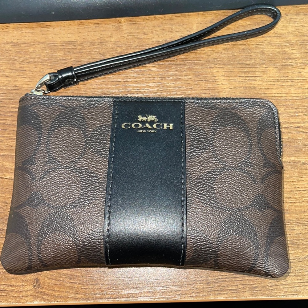 Brown and Black Coach Wristlet